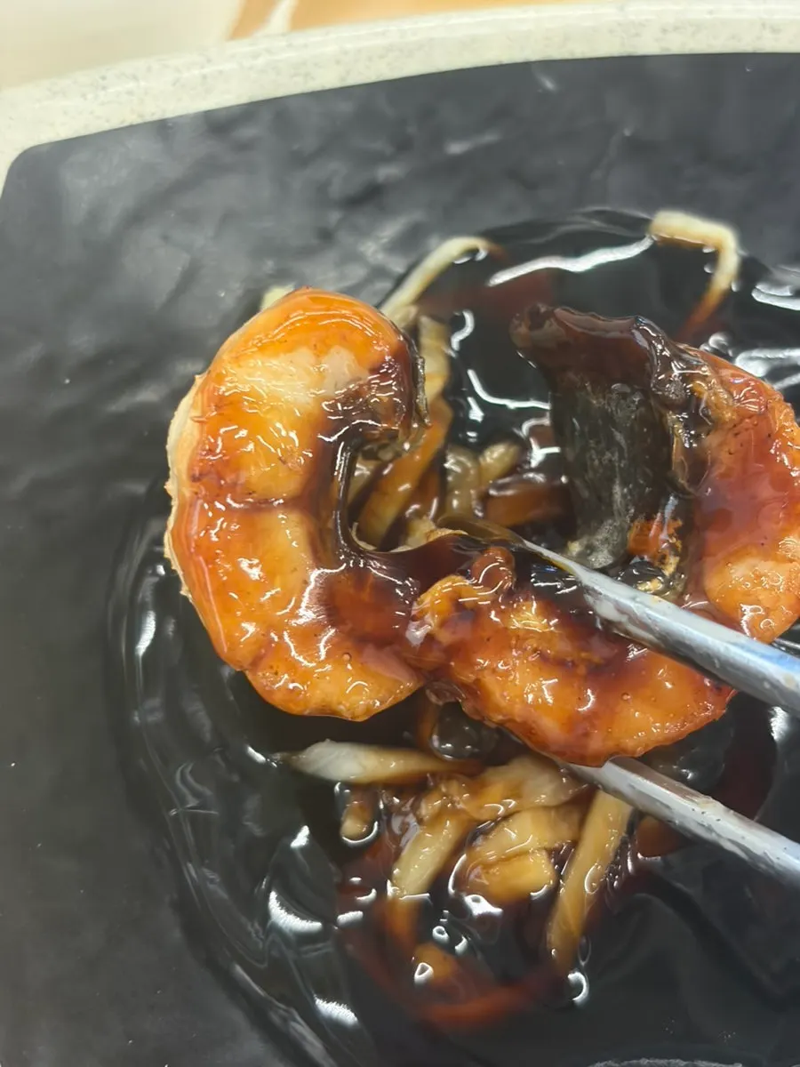 Grilled eel showing its thick, meaty texture