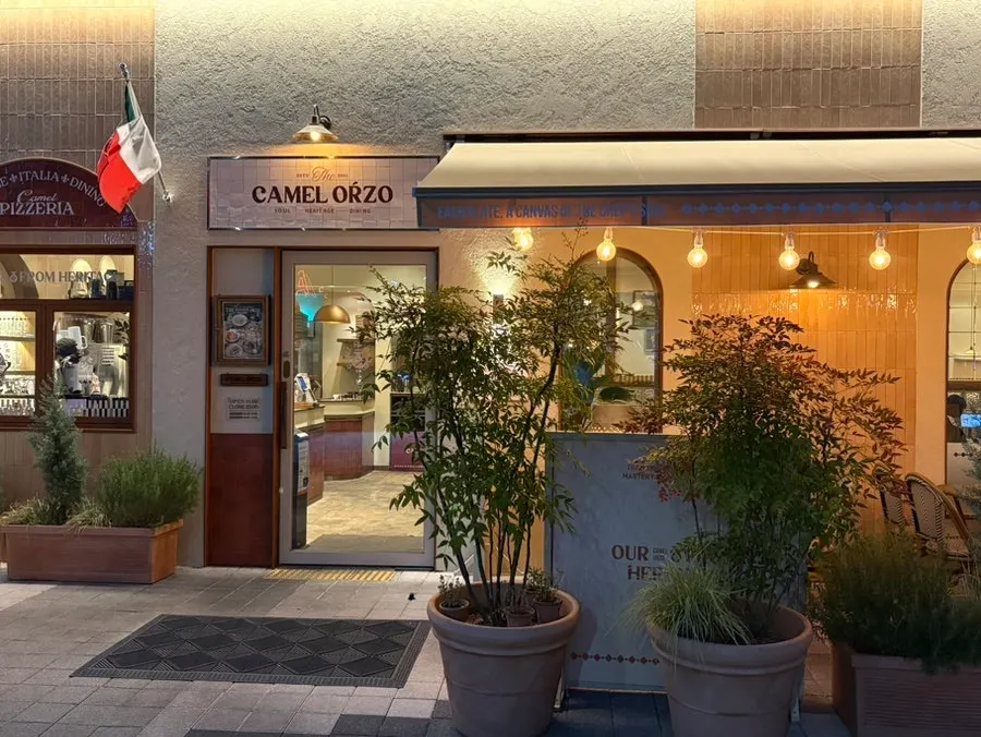 Camel Orzo exterior at night after dark