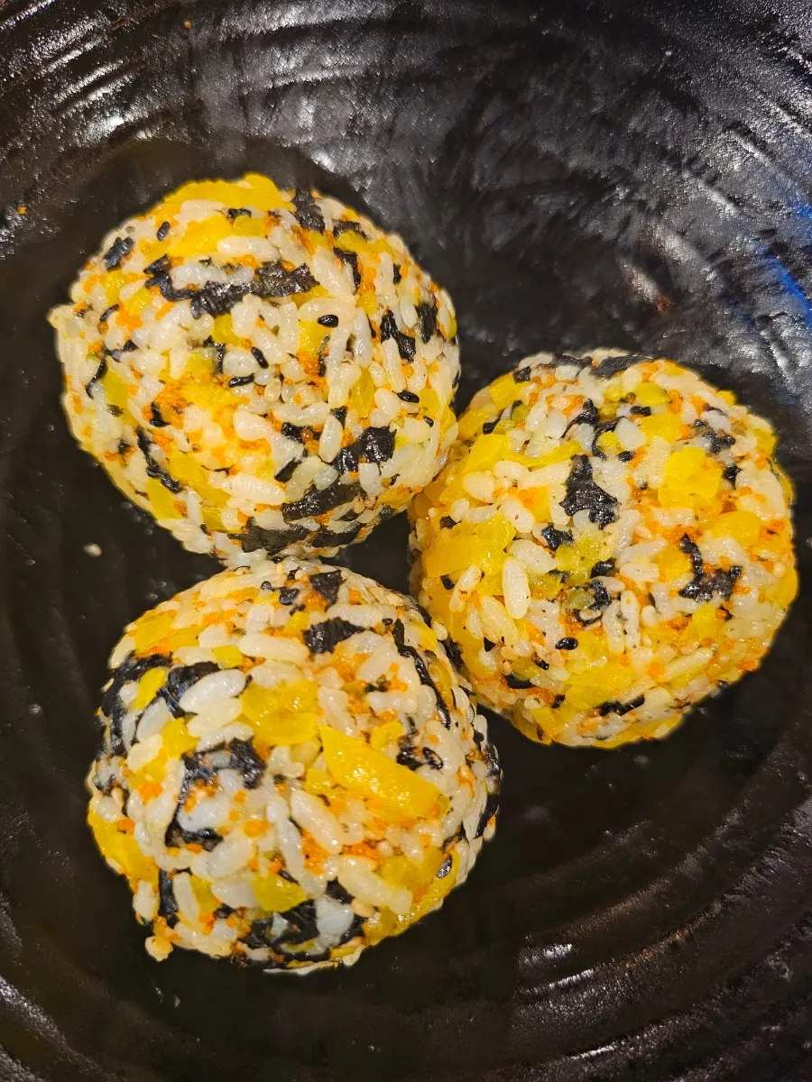 A plate of flying fish roe rice balls