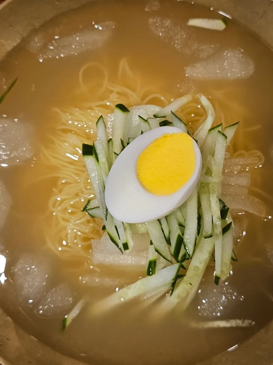 Flying fish roe rice balls served alongside jokbal