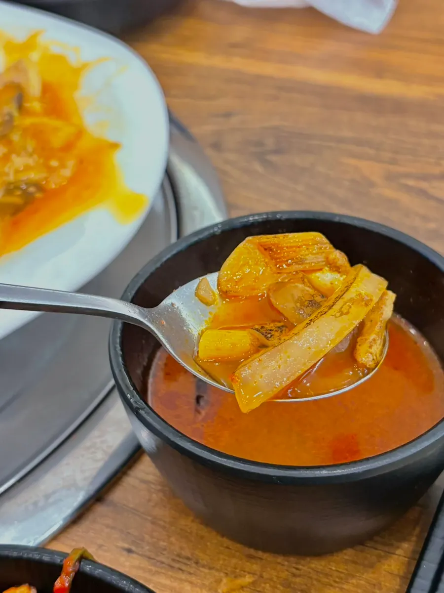 Jjamppong broth served as a default side with the meal