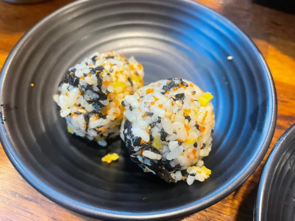 Plate of neatly rolled rice balls