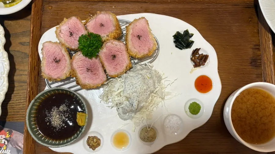 A thick piece of the tenderloin katsu