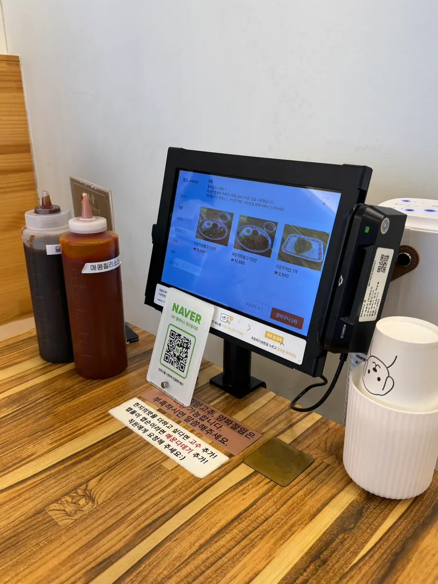Busy restaurant with dine-in guests and delivery orders