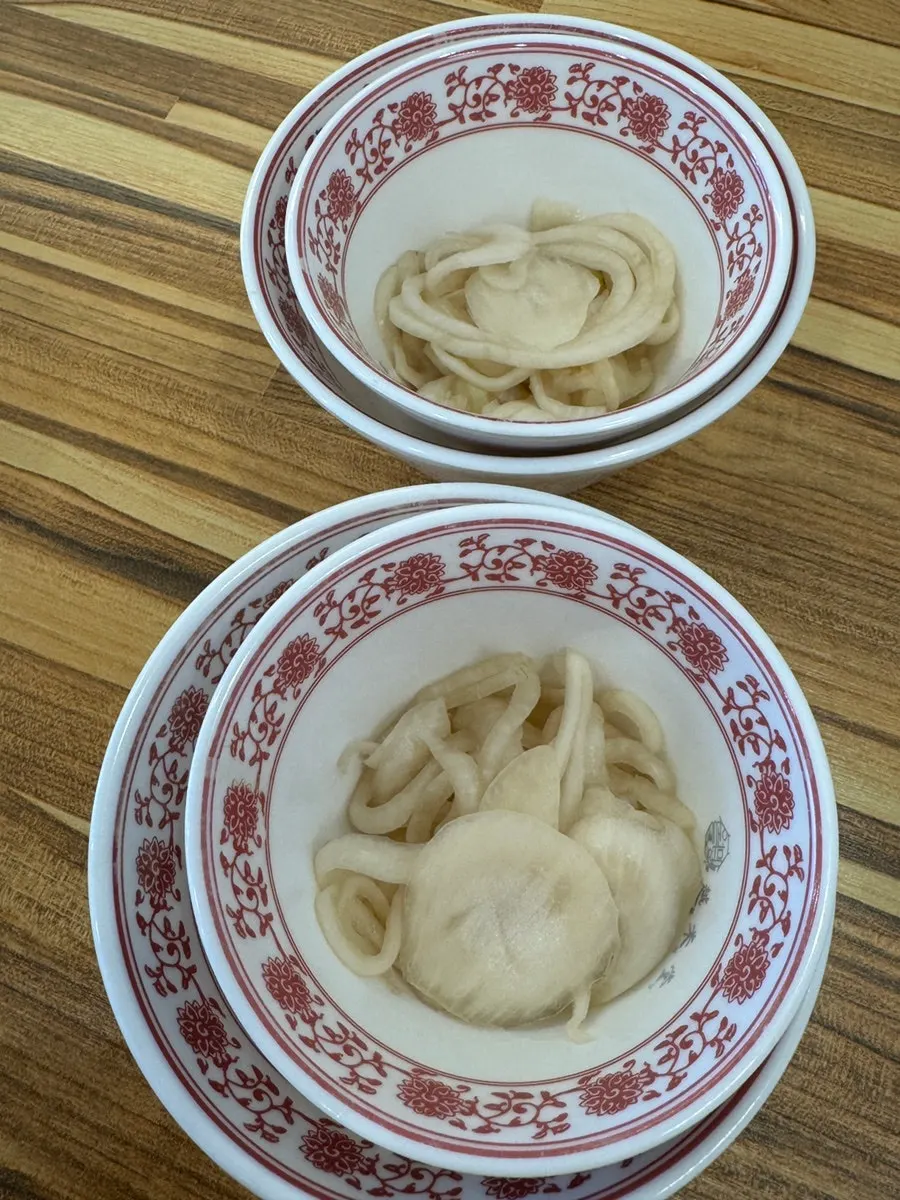 Hoisin sauce and spicy chili sauce set on the table