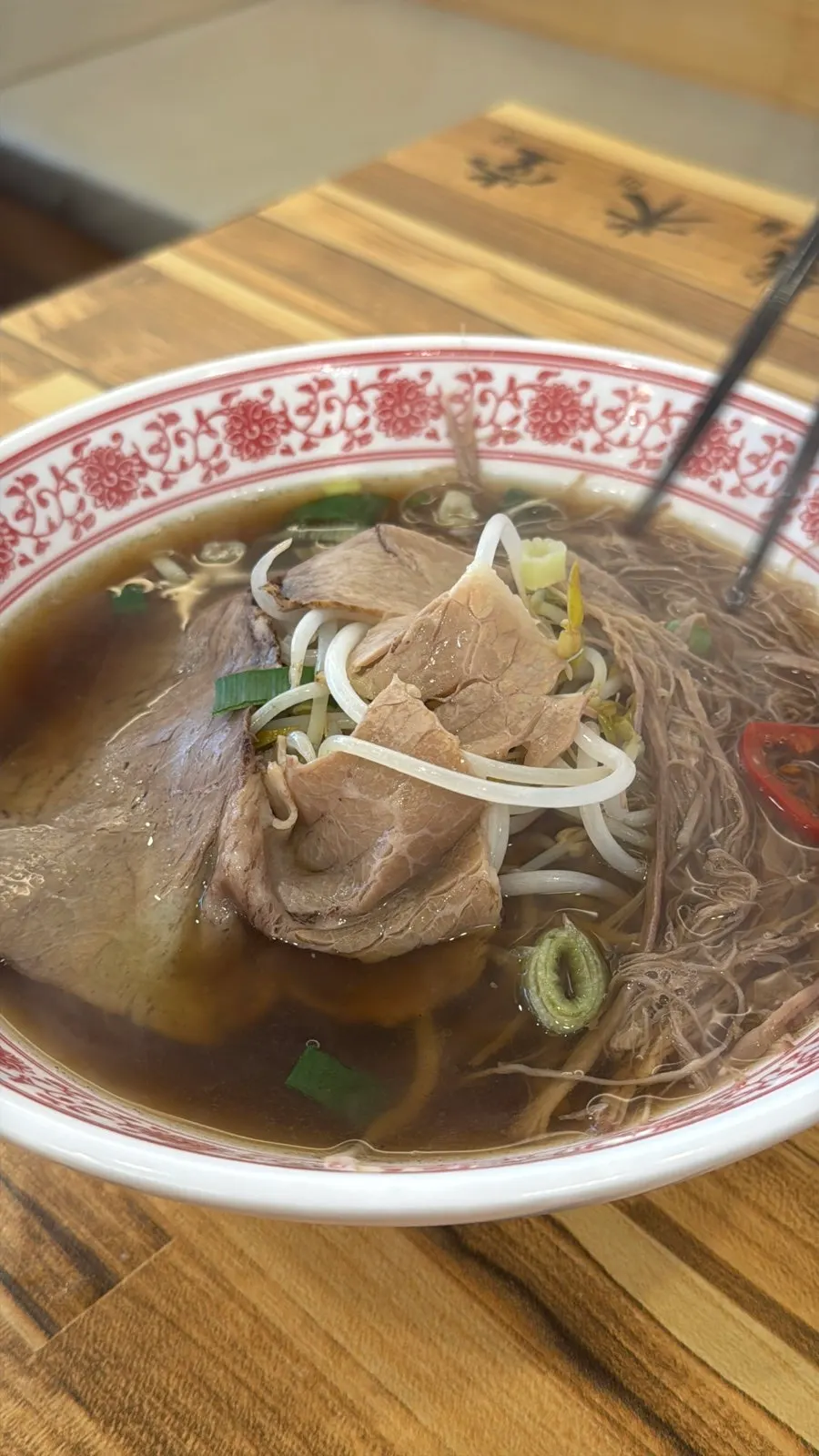 Flat-sliced brisket and shredded beef in the pho