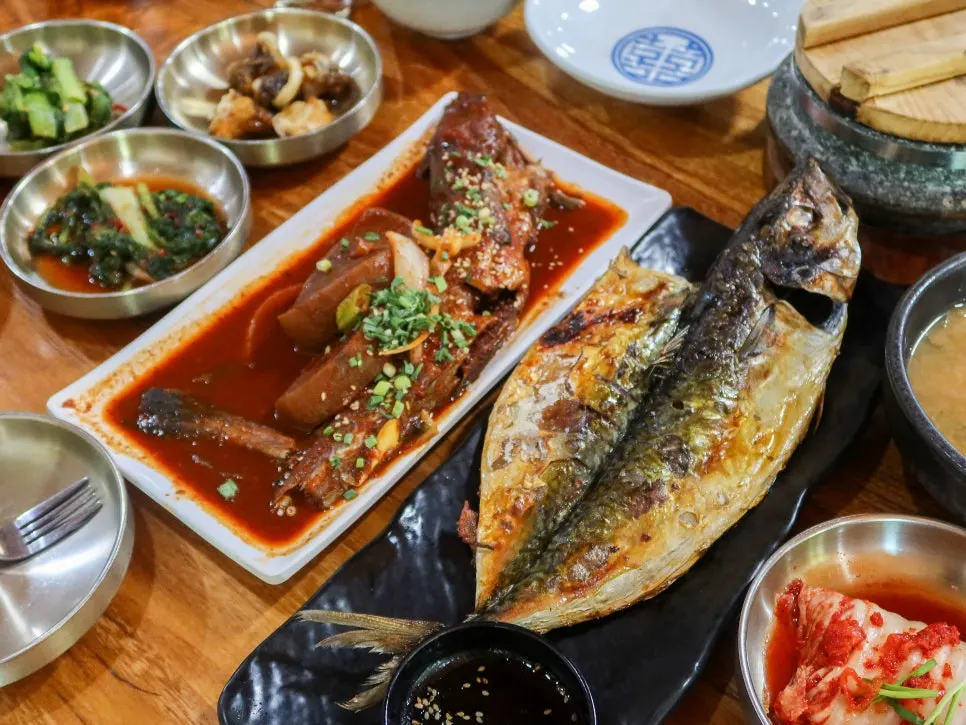 Table with braised dried pollock and grilled mackerel