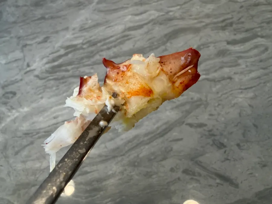 Picking apart the lobster meat