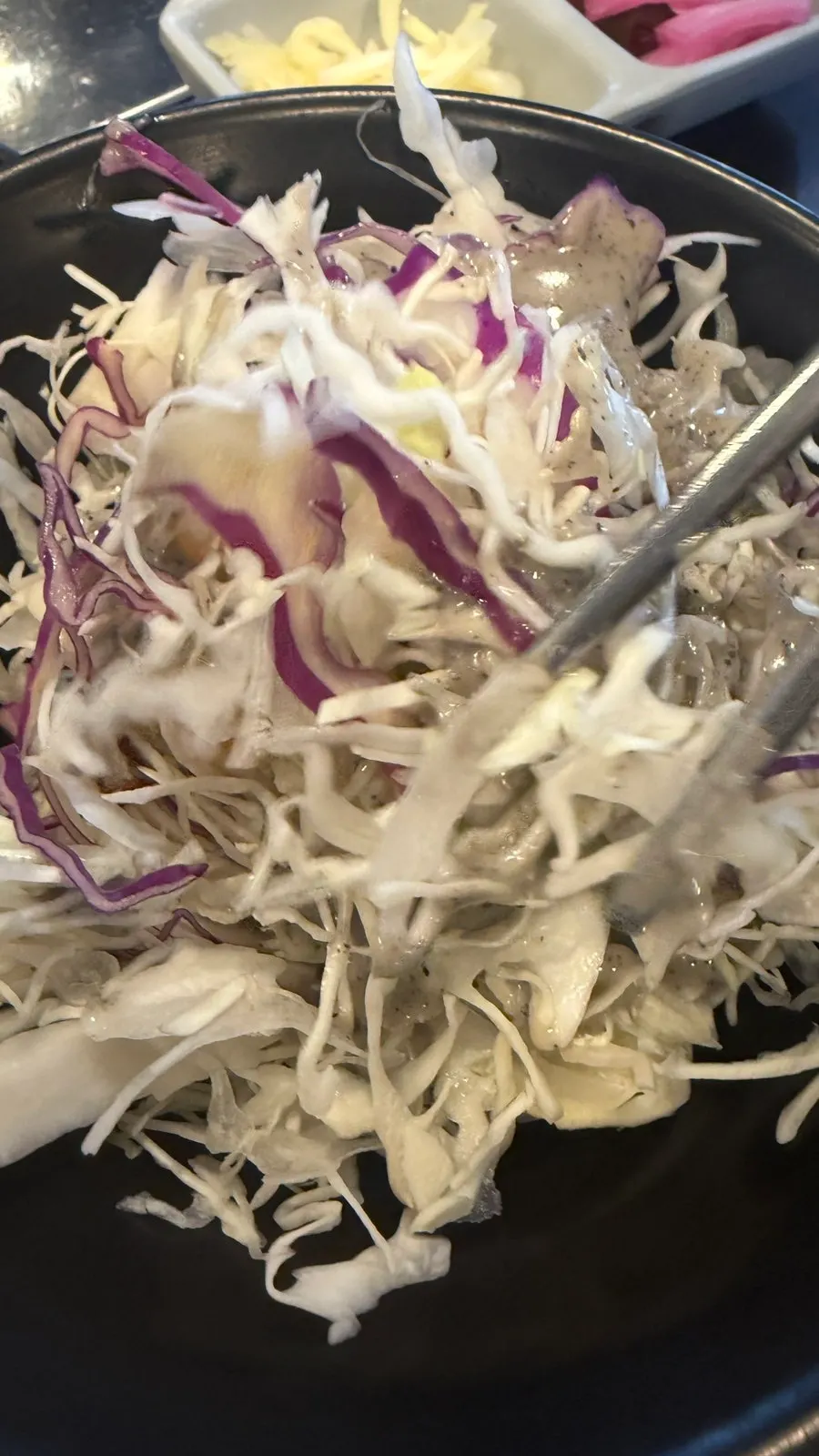 Side dish spread with seasoned bean sprouts and kimchi