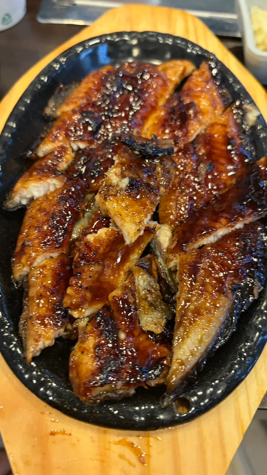 Spicy eel soup with eel meat and chives