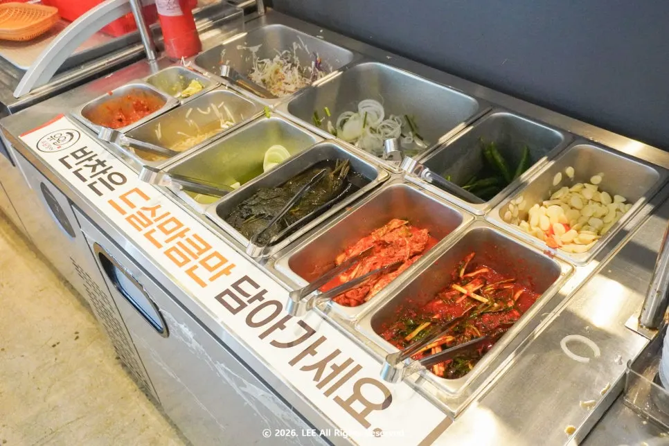 Self-serve bar with side dishes and vegetables