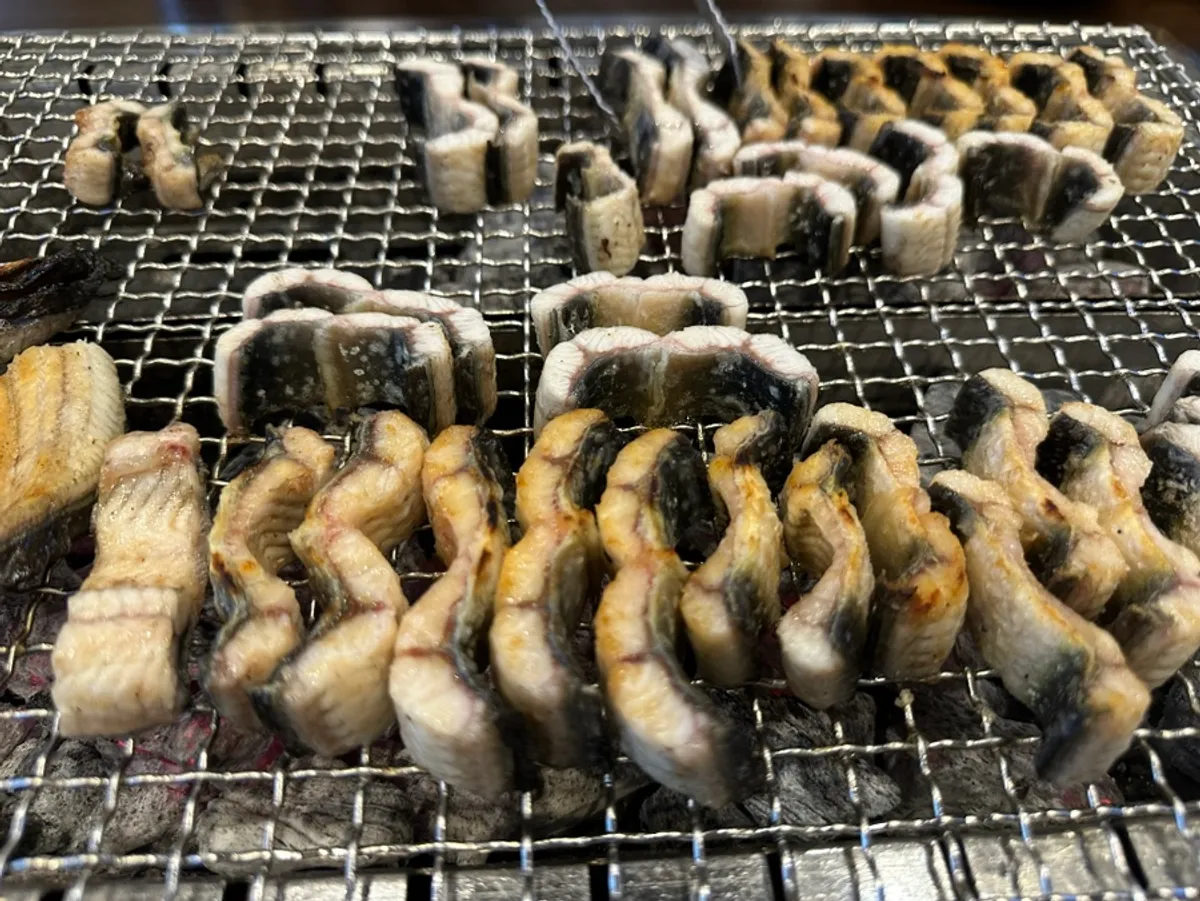 Charcoal-grilled eel table setting at Yuil Jangeo on Donggok-ro, Gwangsan, Gwangju