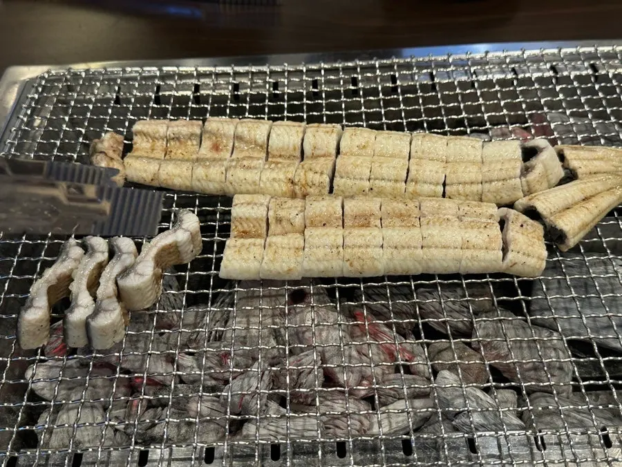 Hot charcoal grill placed on the table