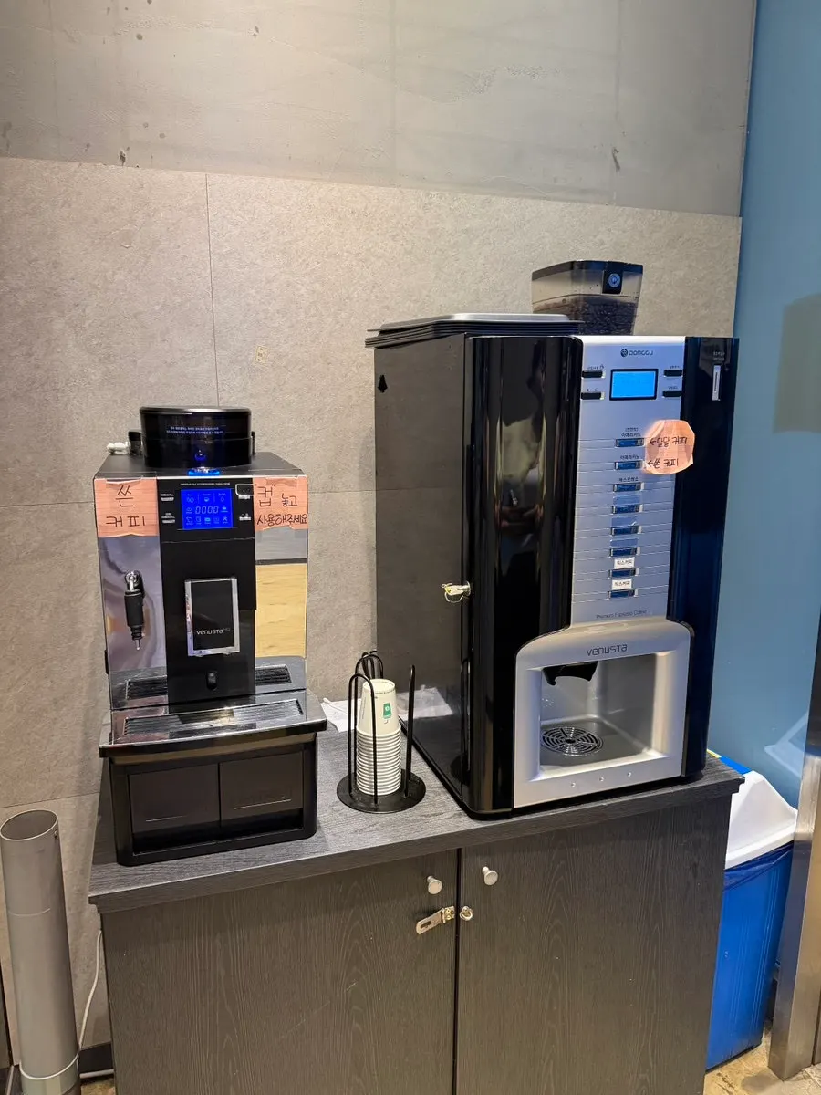 Self-serve coffee machines available after the meal