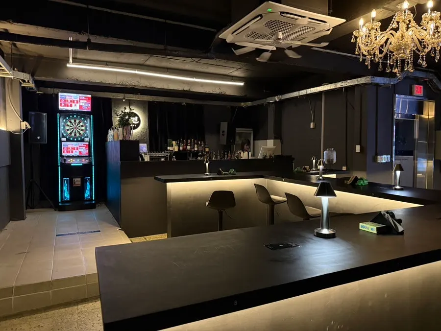 Bar seating and interior mood at Chomyeon solo-drinking bar