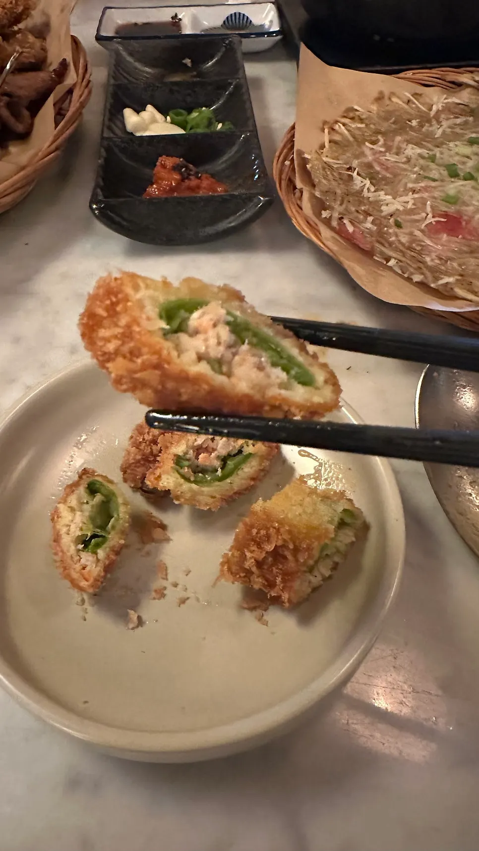 Crispy fried peppers and yukjeon dishes