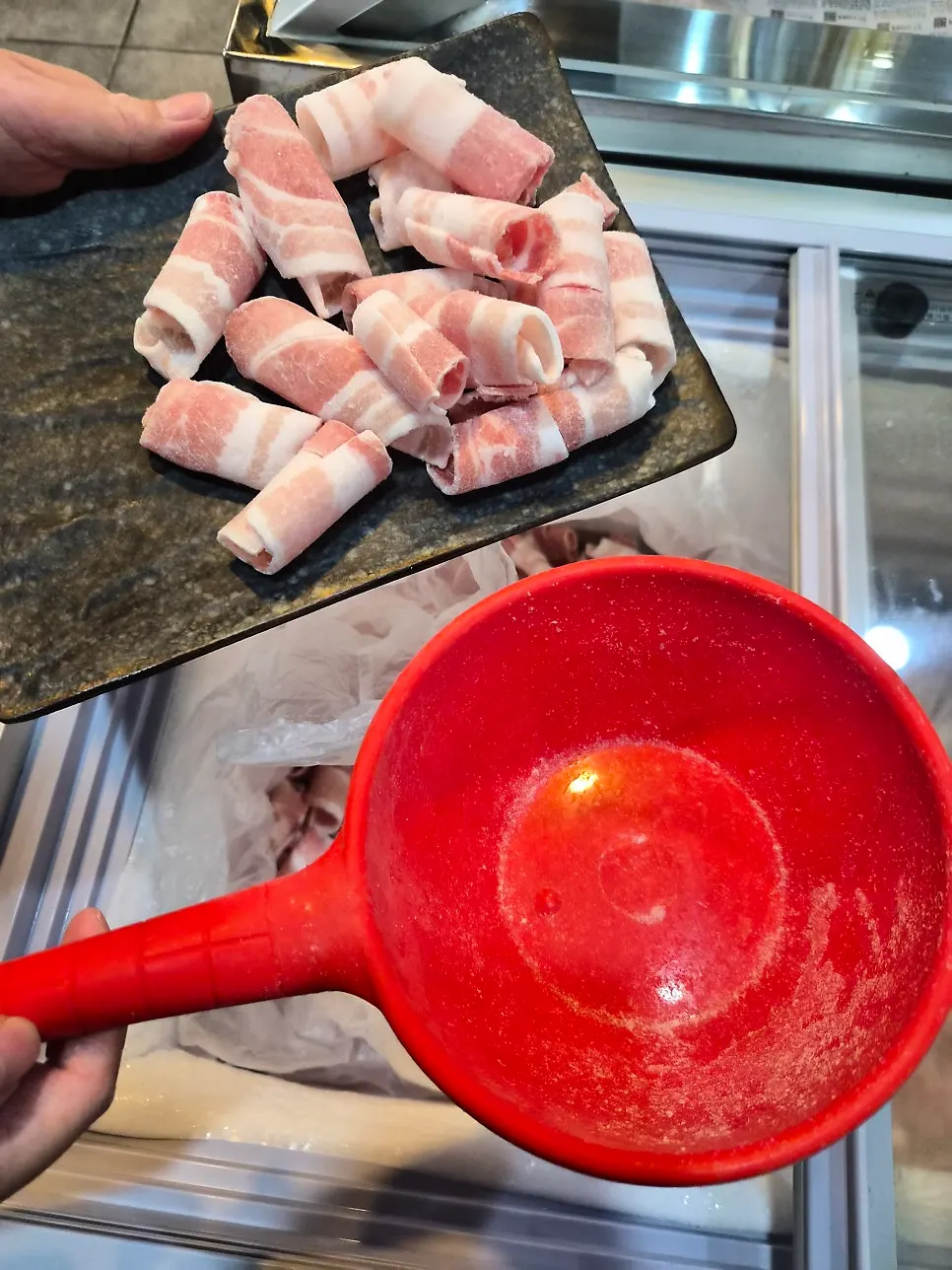 Unlimited refill self-bar with thin-sliced and fresh pork belly