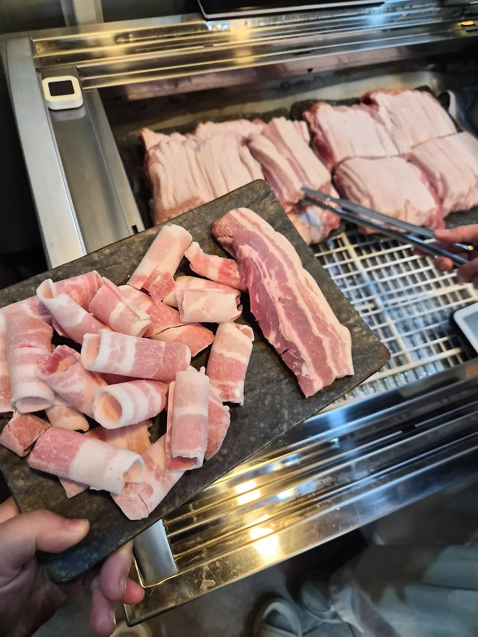 Pork belly laid out on the self-bar