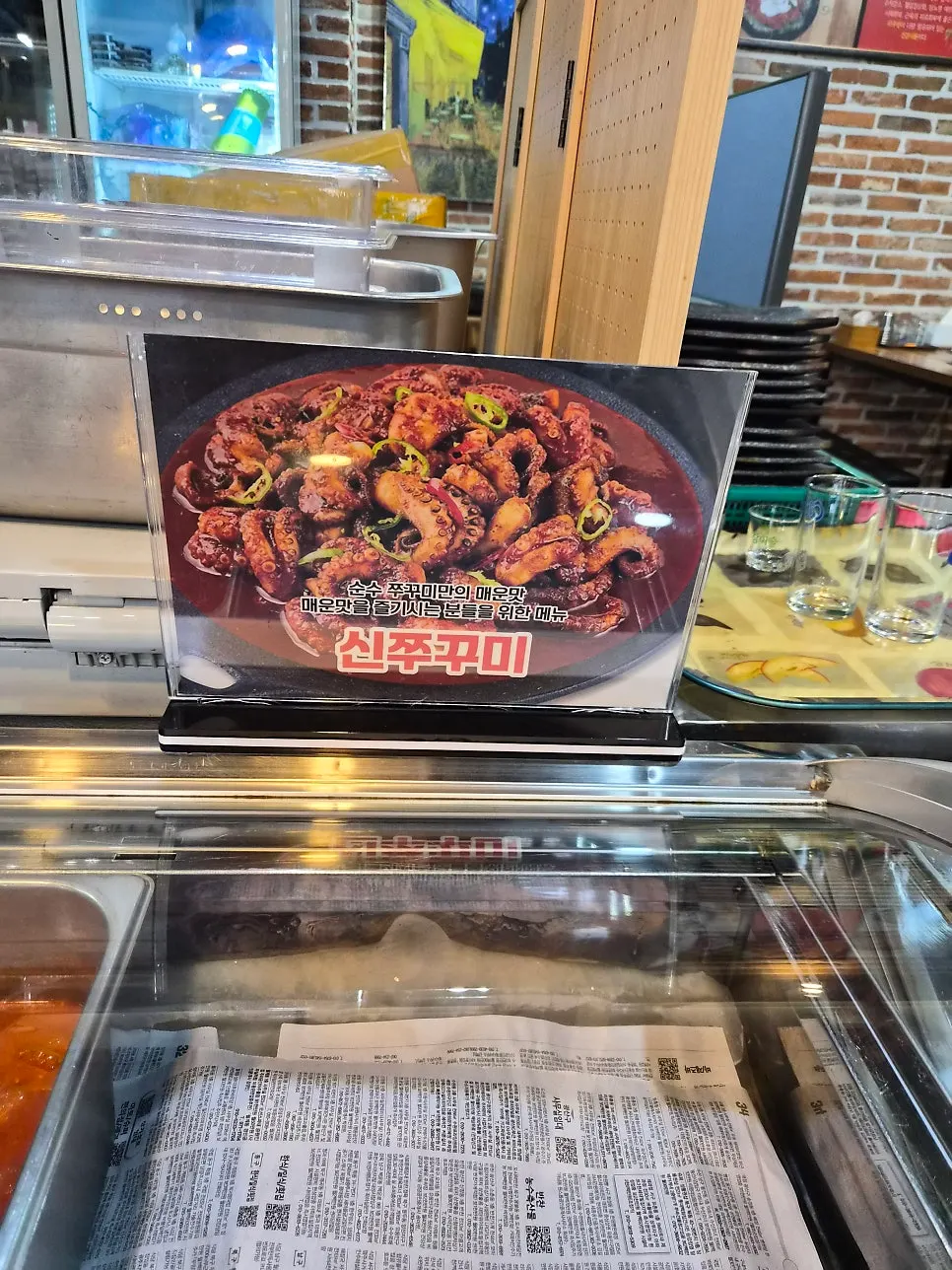 Octopus and meat placed side by side at the self-bar