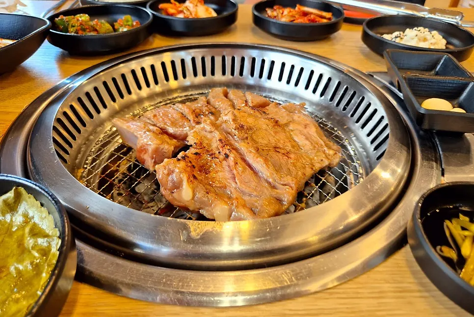 Marinated pork ribs placed over charcoal