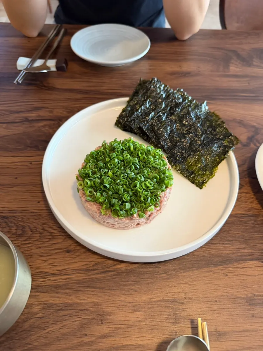 A Korean bar spread with chilled pork jowl and gangdoenjang beef tartare