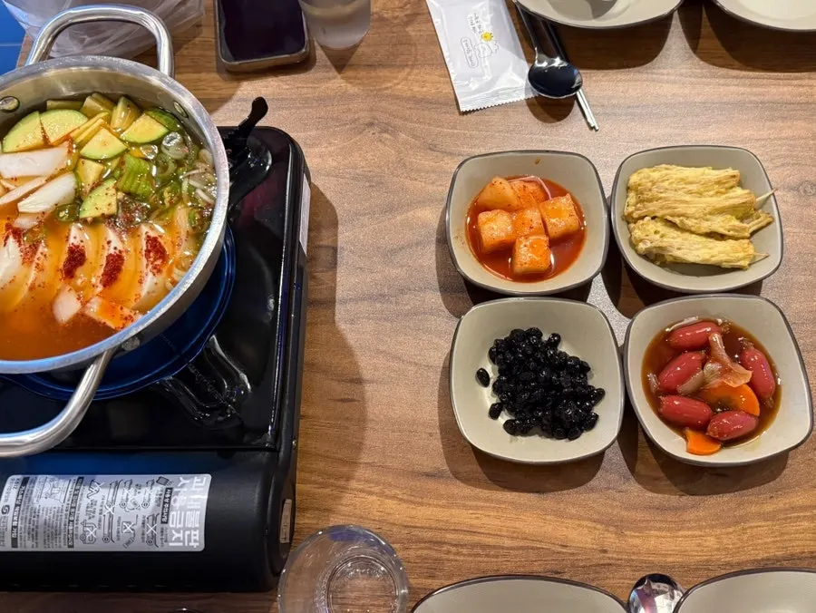 Jeongdam's menu board showing ox tail stew prices