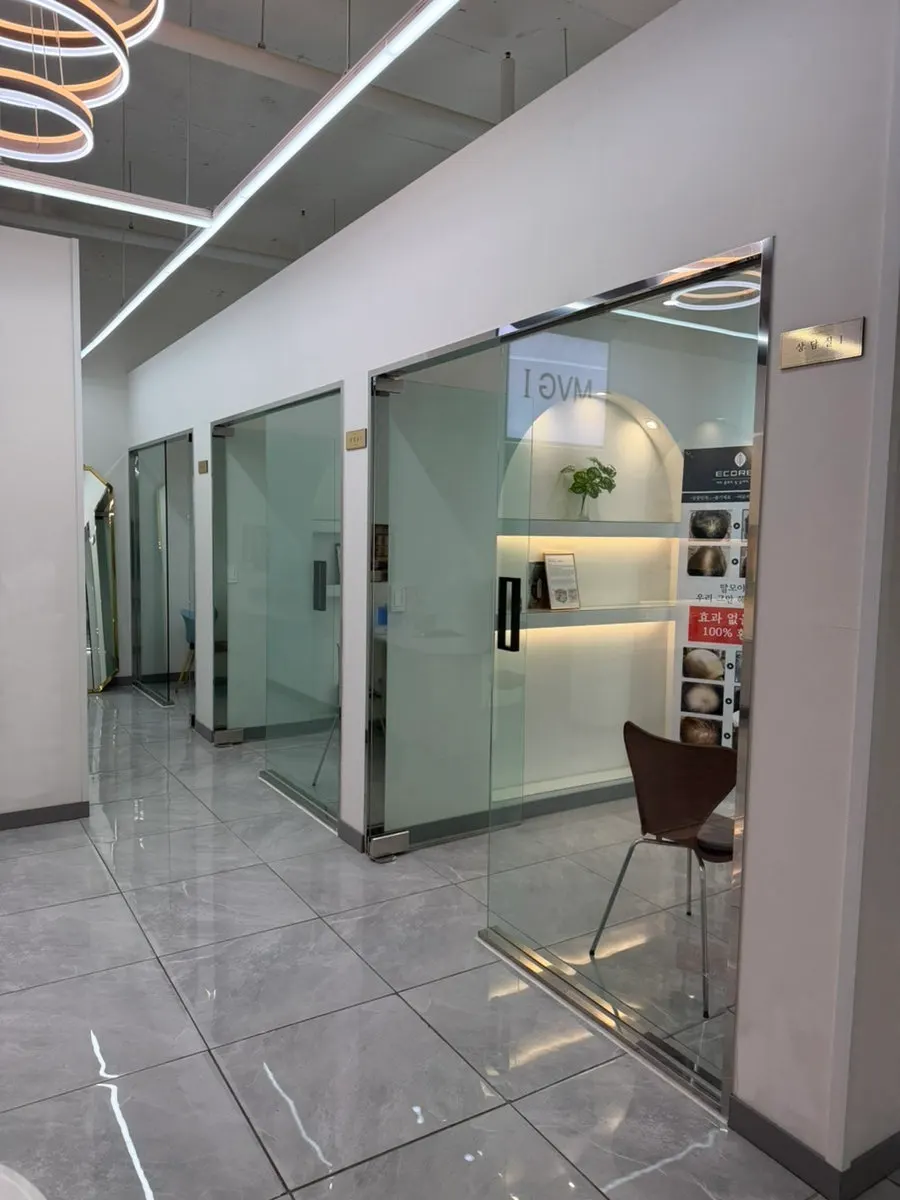 The building entrance and stairway up to the 2nd floor