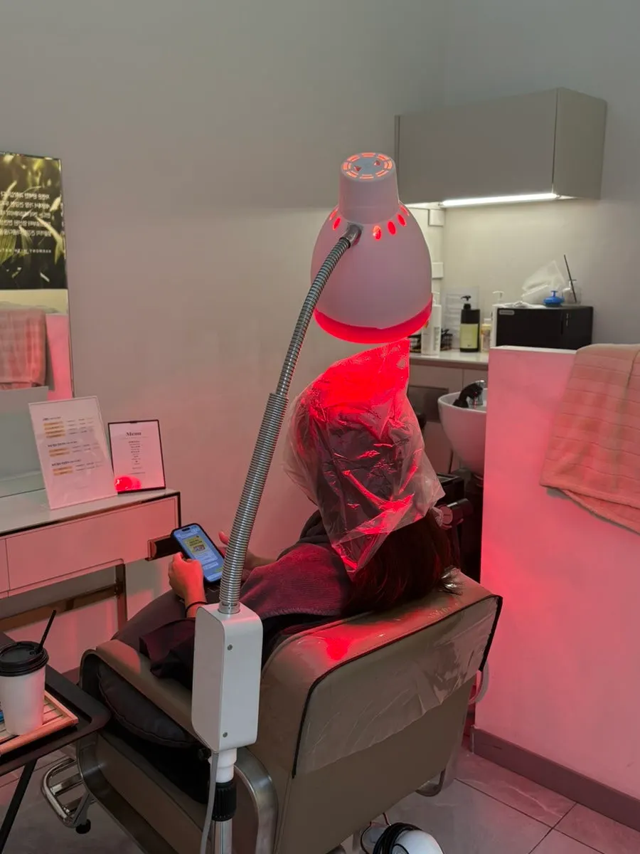 Hair loss care being received in the private head spa room