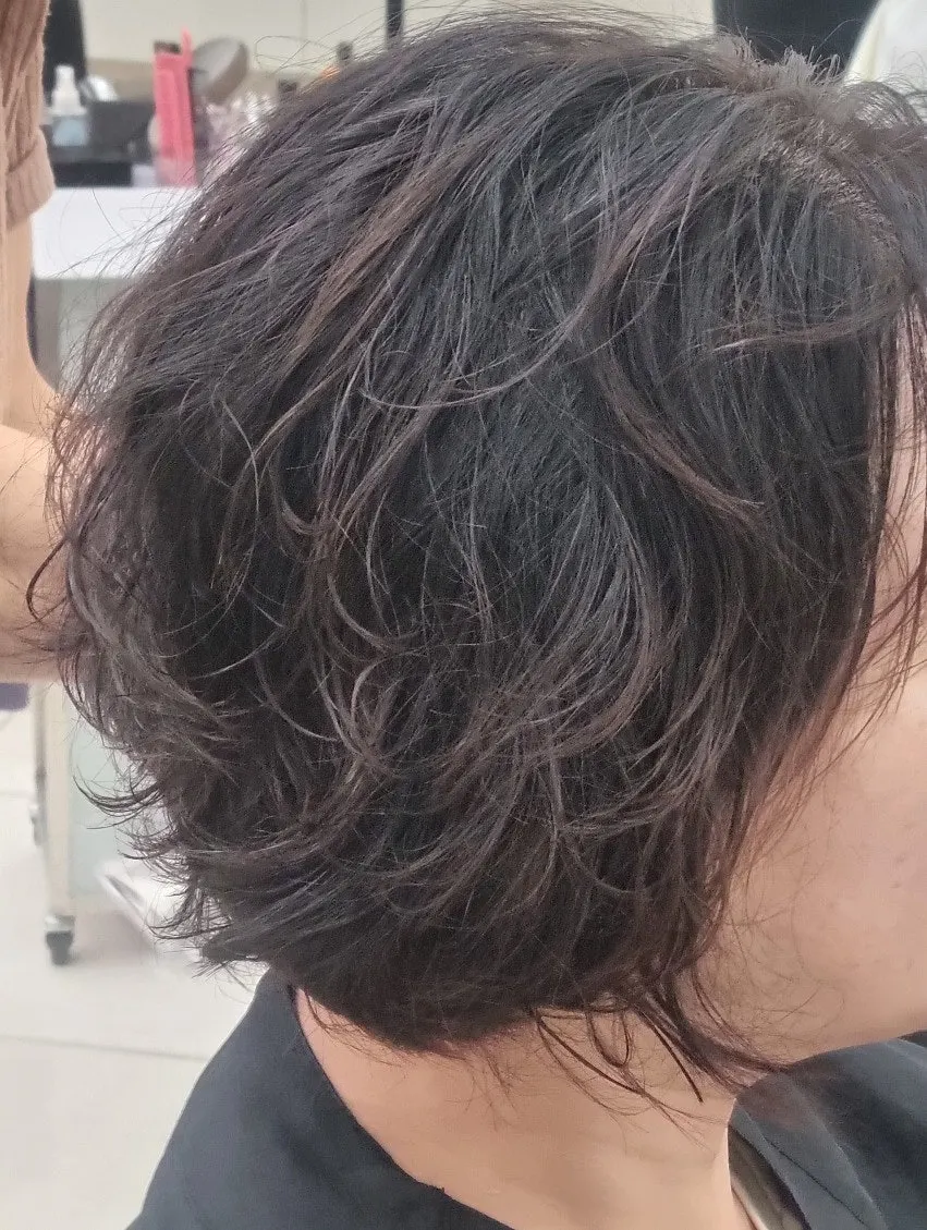 Soft hairstyle after the perm