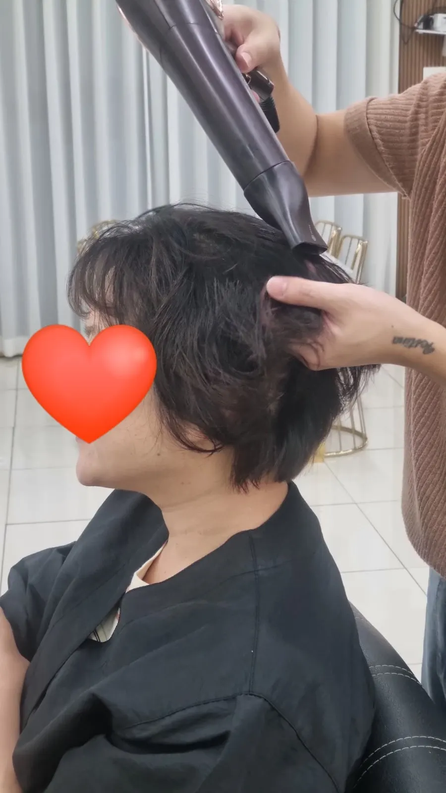 Perm style with lifted root volume