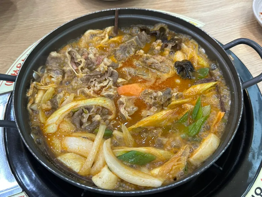 Usin jeongol with reduced broth