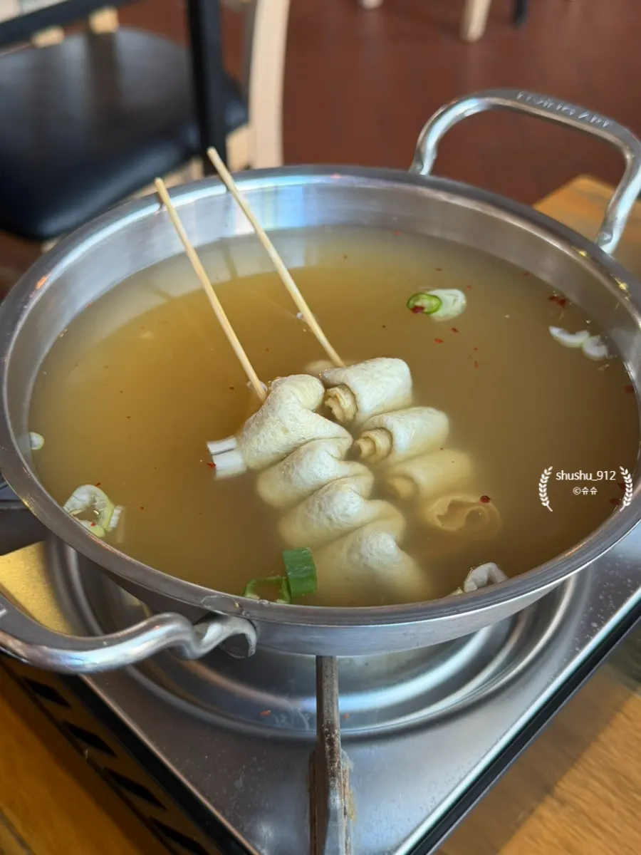 Spicy fish cake soup with fish cake skewers