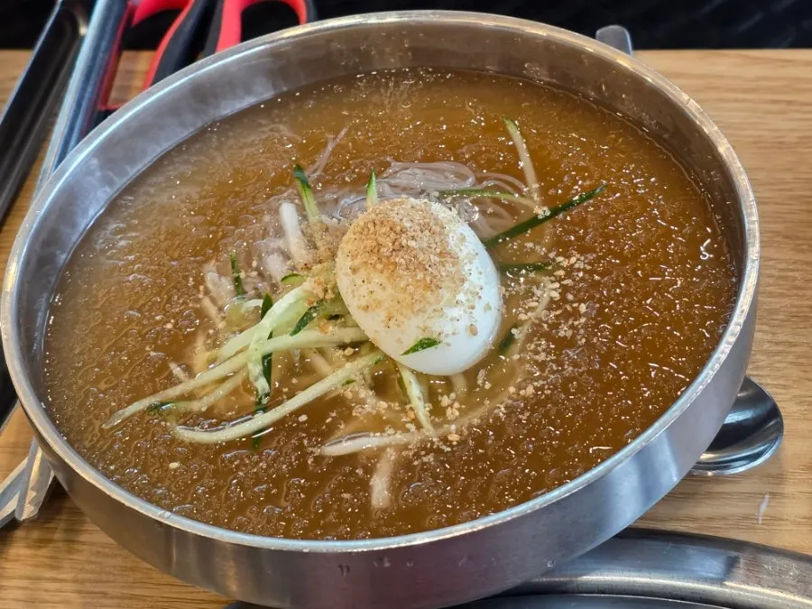 Meat wrapped around bibim naengmyeon for dessert