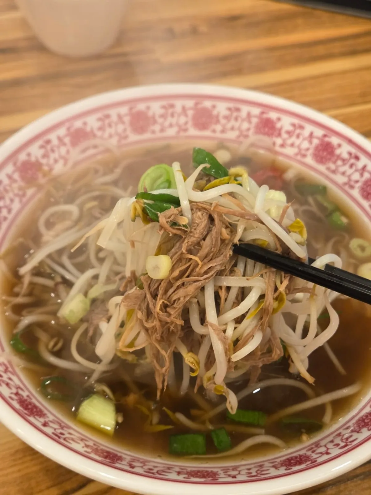A bowl of beef brisket pho