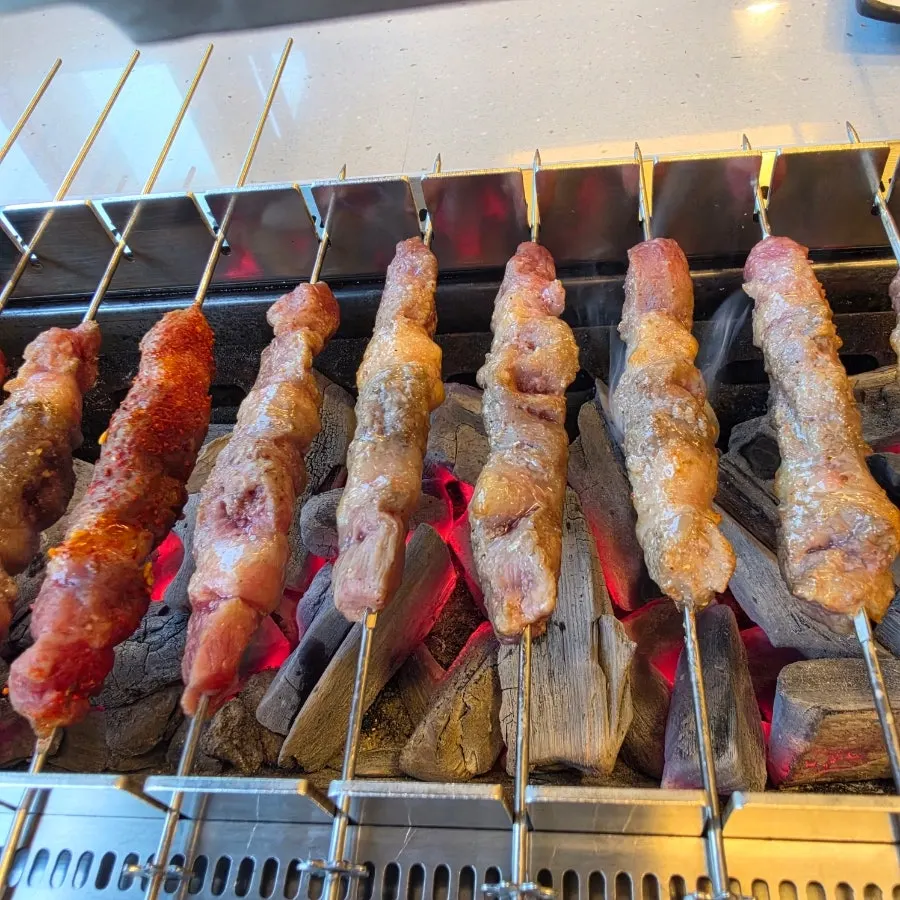 Order comparing original and seasoned lamb skewers
