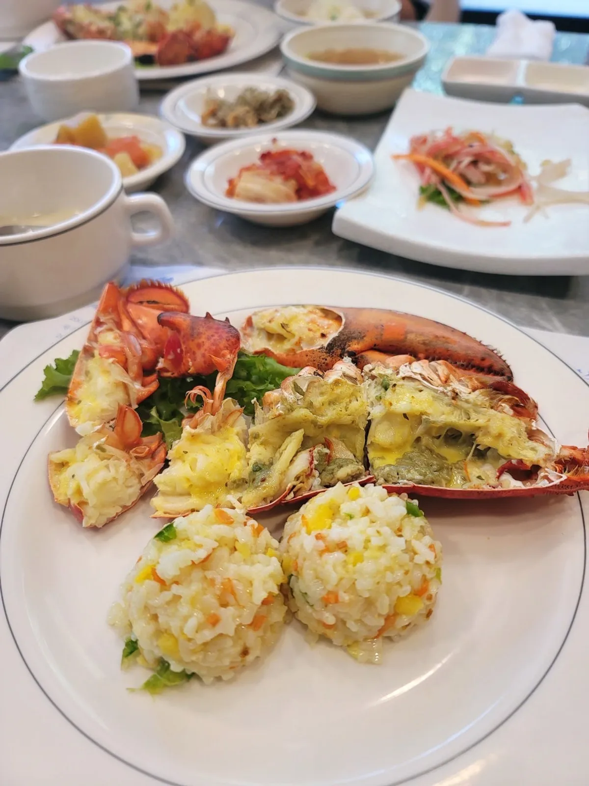 Lobster course table setting at Tams Badaetgaja in Jisan-dong, Gwangju