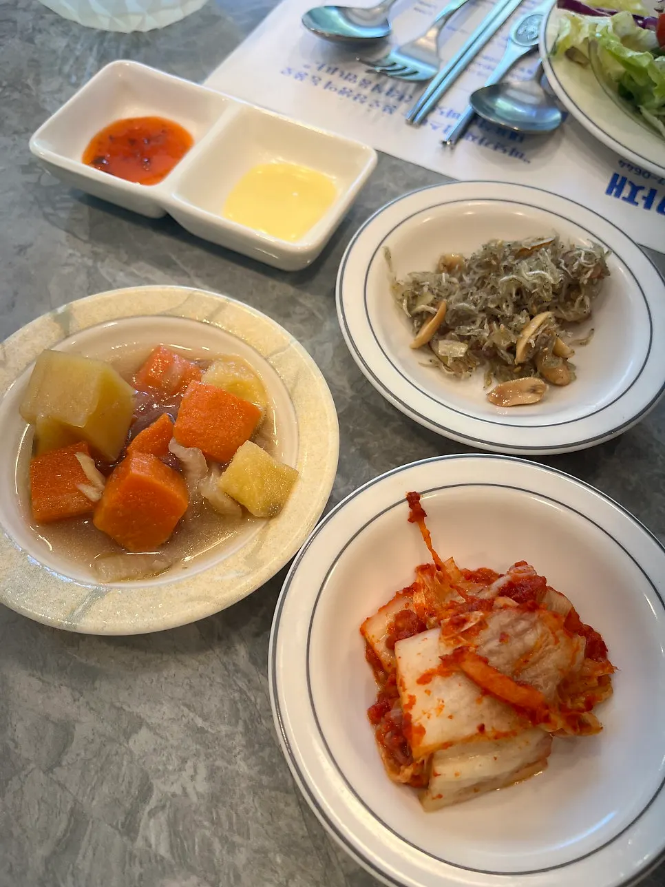 Neatly arranged side dish plates