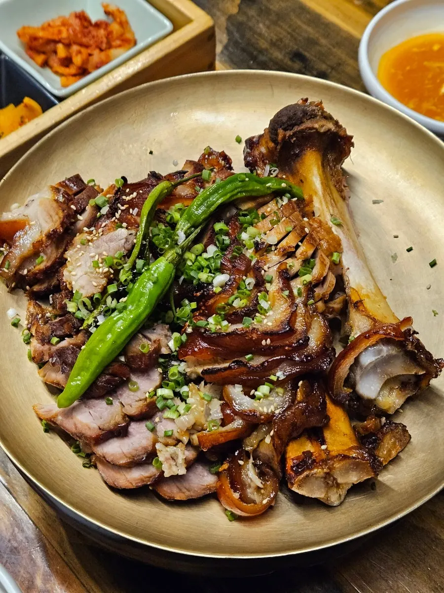 Shared plate with dried radish strips, pickled radish, and ssamjang