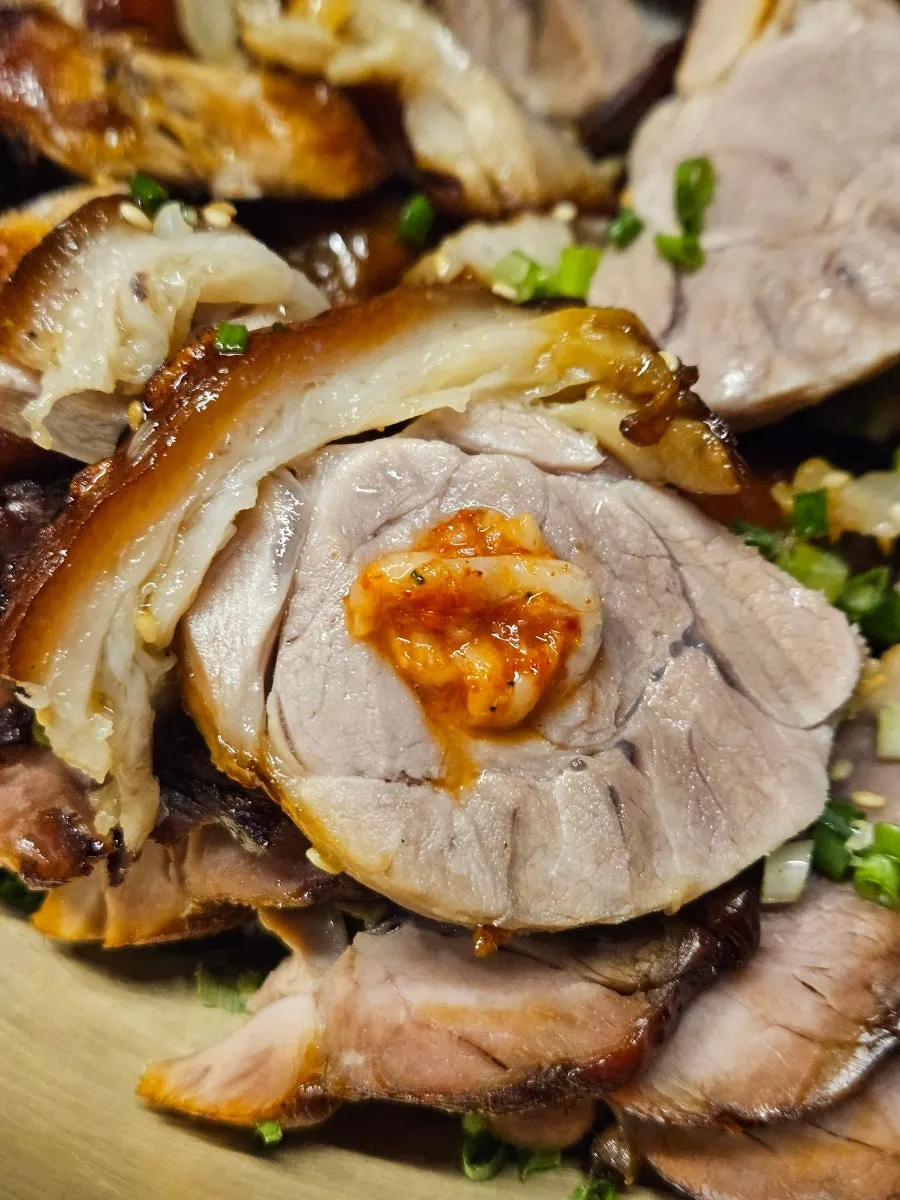 Close-up of wood-fired trotters made with domestic front leg meat