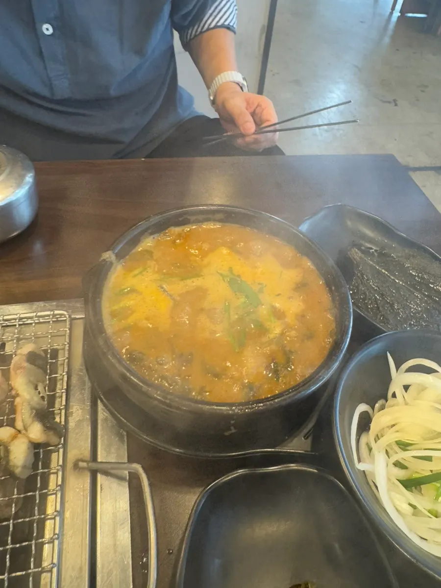 A generous portion of charcoal-grilled eel cooking