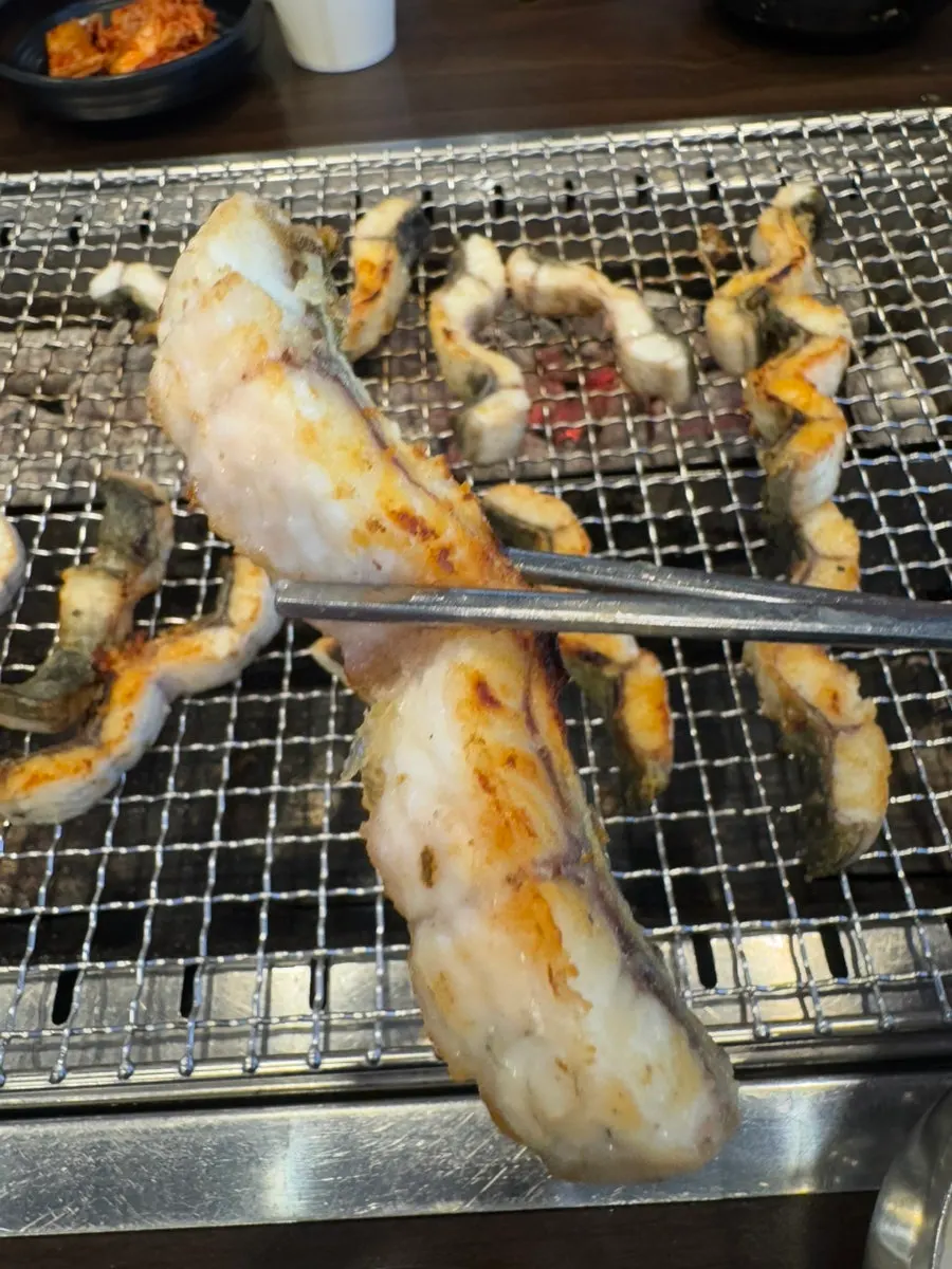 Grilled eel ready to wrap in lettuce