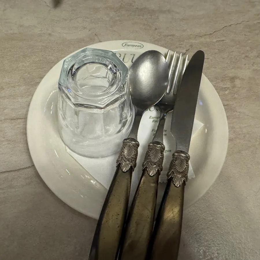 Table set with cutlery and napkins