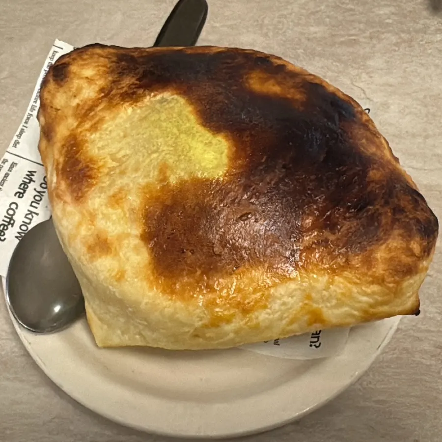 Pumpkin pastry soup topped with pastry