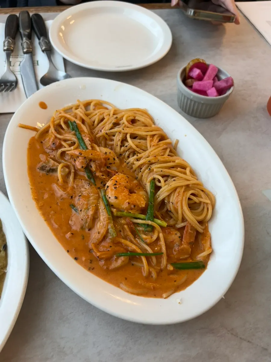 Shrimp rosé pasta with plump shrimp on top