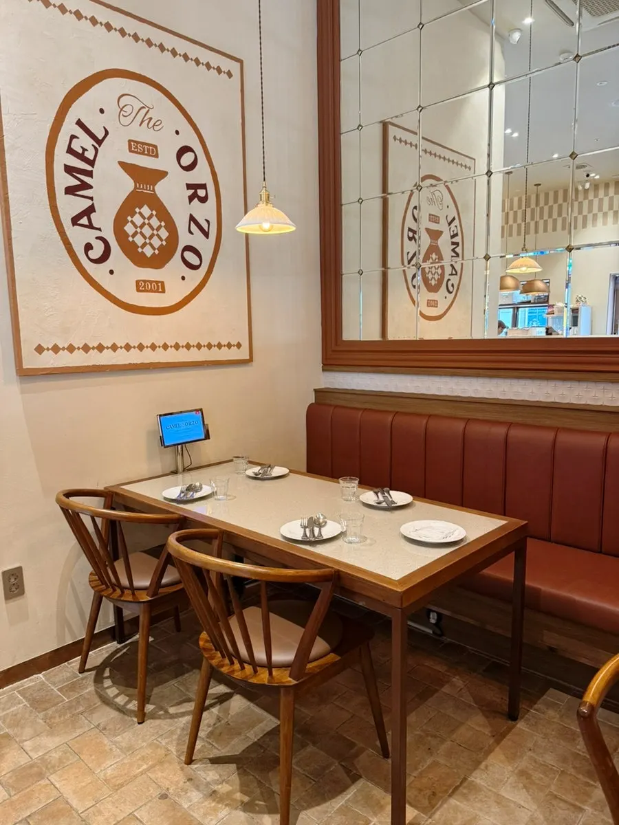 View of the dining tables inside Camel Orzo