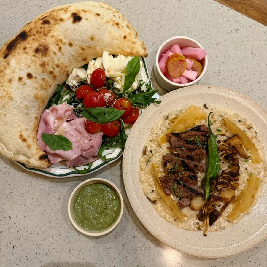 Basil calzone and manjo risotto served together