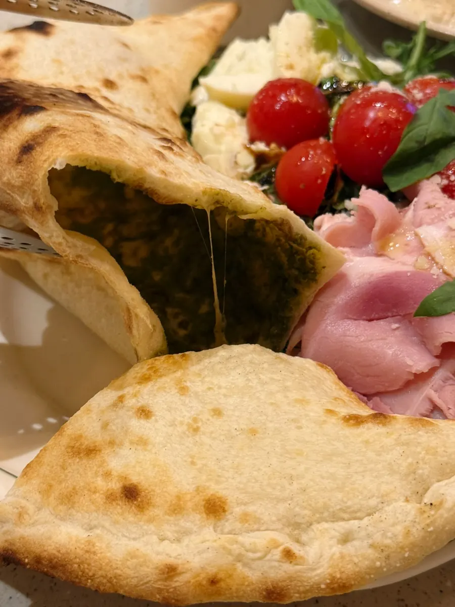 Cross-section of the calzone with stretchy cheese