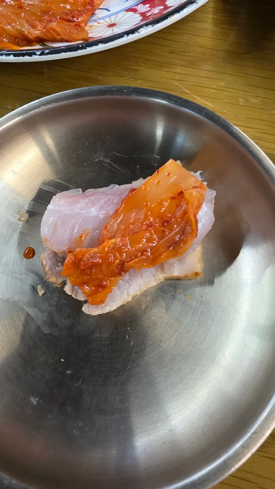 Samhaph with boiled pork, aged kimchi, and fermented skate