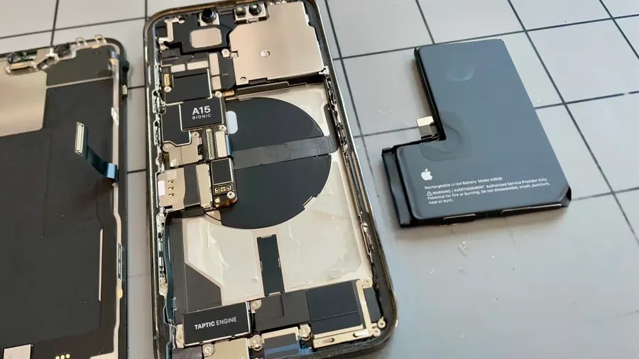 iPhone battery replacement underway at the SANFIX workbench