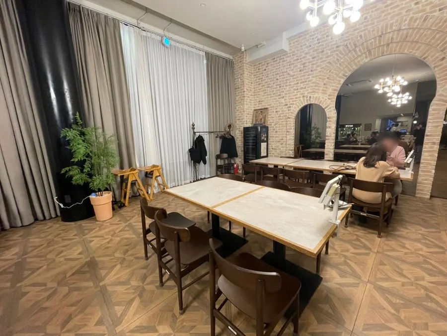 Corner of the restaurant with a coat-hanging space